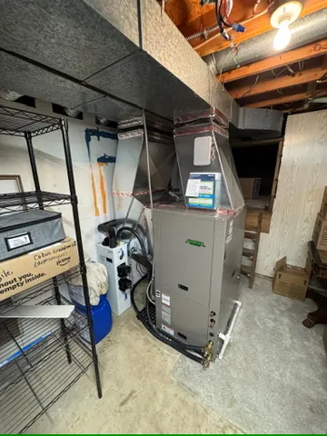 Geothermal heat pump installed in a Dayton, MN basement